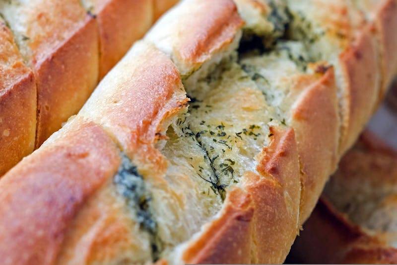 Knoblauchbrot mit Kräuterbutter bei Call a Pizza